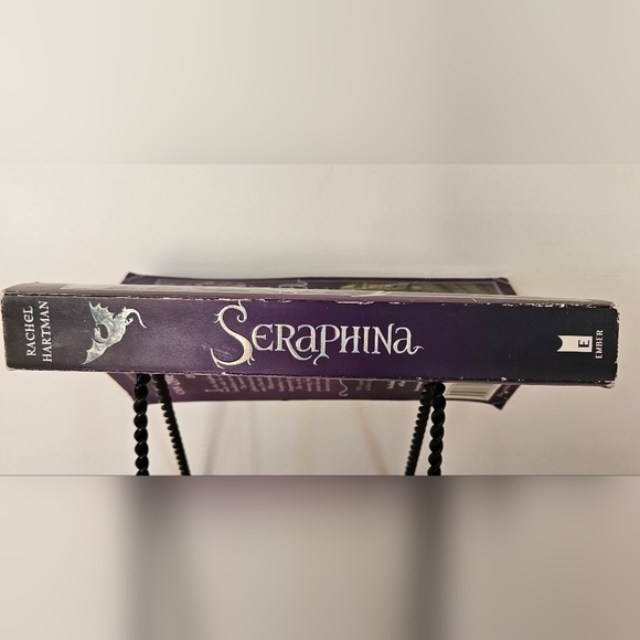 Seraphina Rachel Hartman  Can one girl unite two worlds? Kids Toy Book - Picture 8 of 12